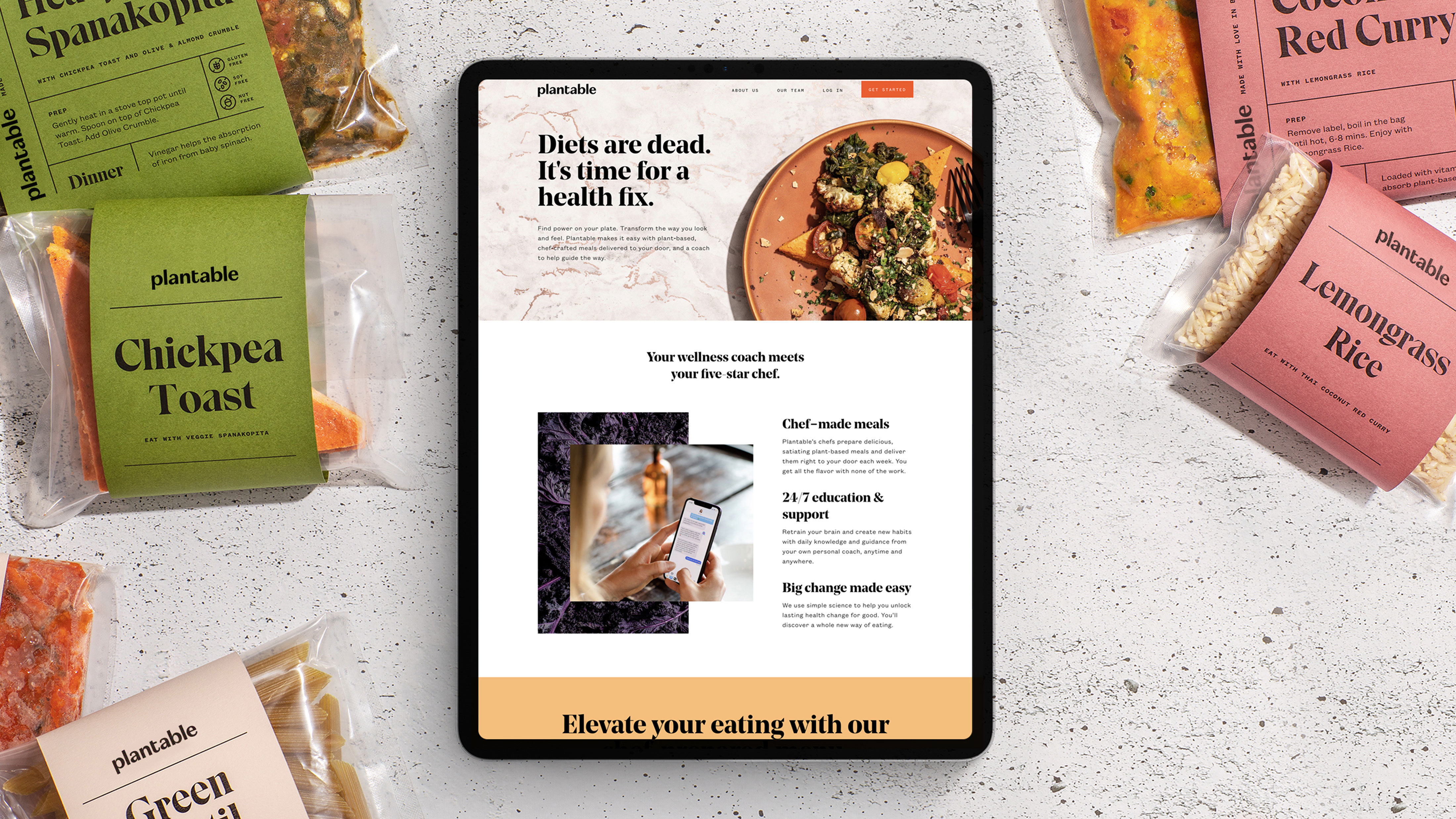 Ipad with Plantable website on a countertop with Plantable packaged food