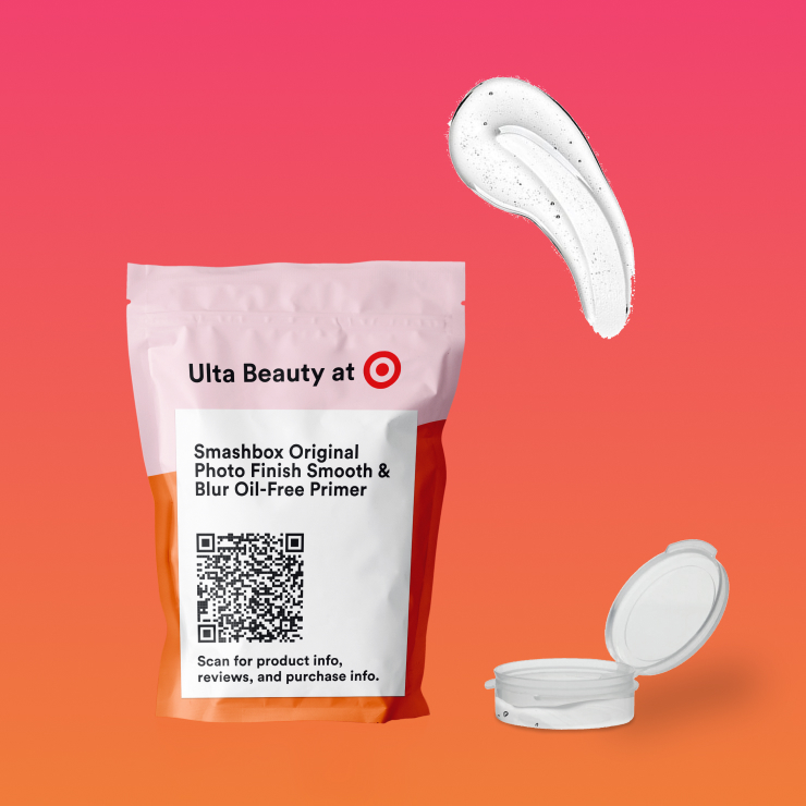A small red, orange and pink pouch that is an example of Ulta Beauty at Target sample product packaging.